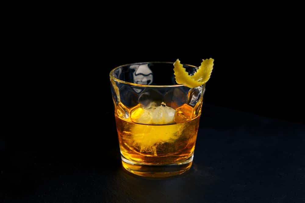 Cocktail Rusty Nail On Black Background