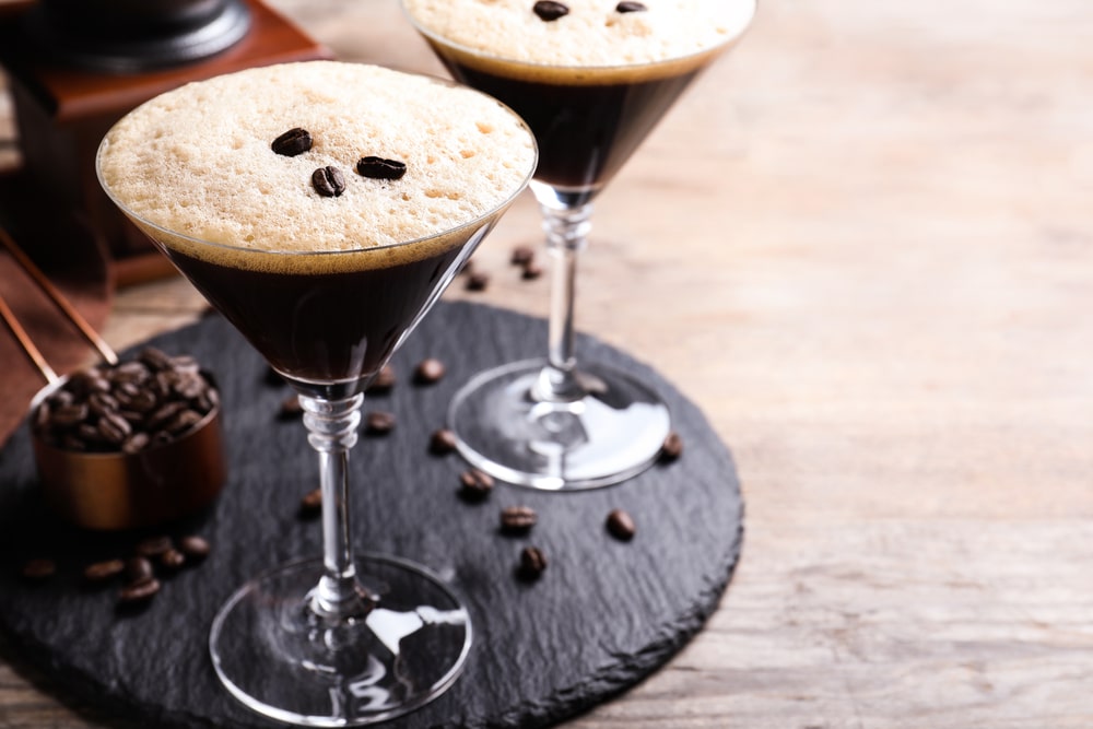 Glasses Of Fresh Coffee Cocktail On Wooden Table Space For