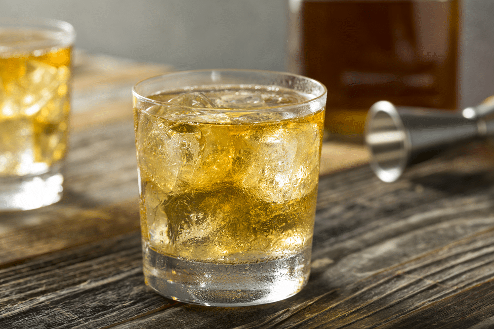 Refreshing Alcoholic Scotch and Soda Cocktail with Ice