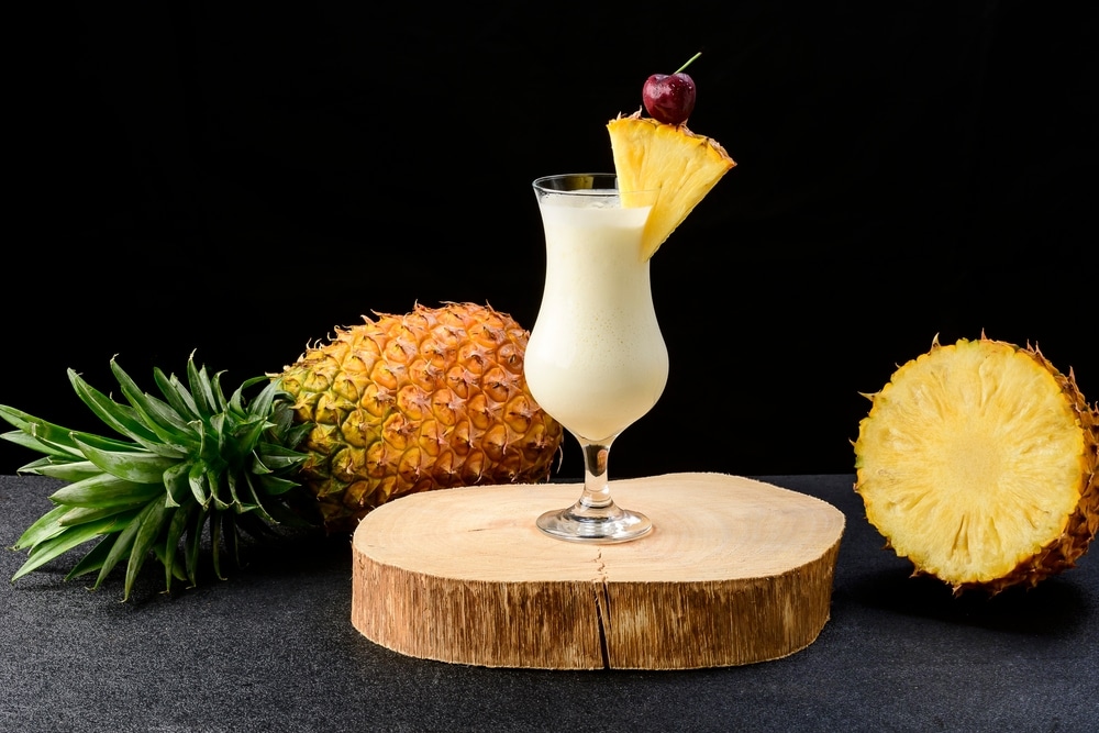 One Glasses With Pina Colada Cocktail A Whole Pineapple Next