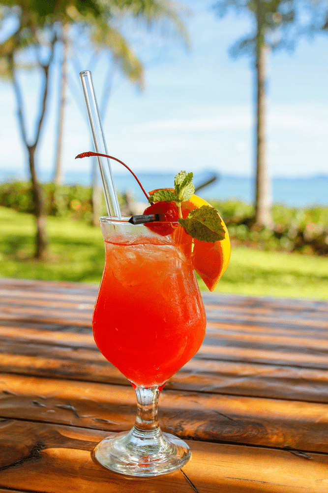 A view of a glass of a hurricane drink