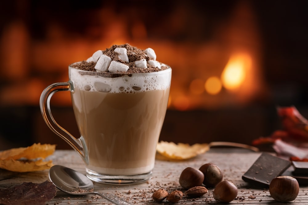 A view of a cup of hot chocolate with marshmellows on top