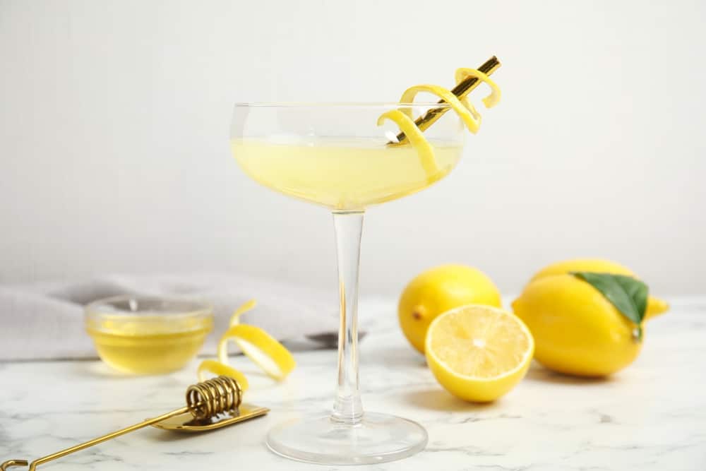 A view of a glass of bees knees cocktail